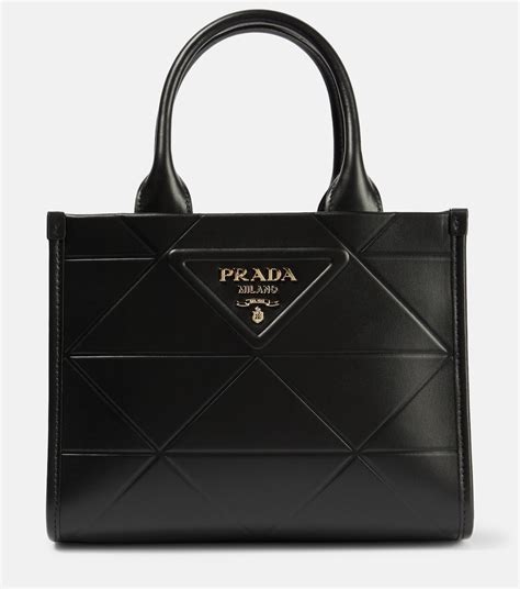 mini duffle bags by prada.